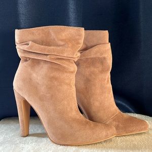 Suede high heeled bootie. Nude/tan suede. Women’s size 6. 4 1/2 inch heel.
